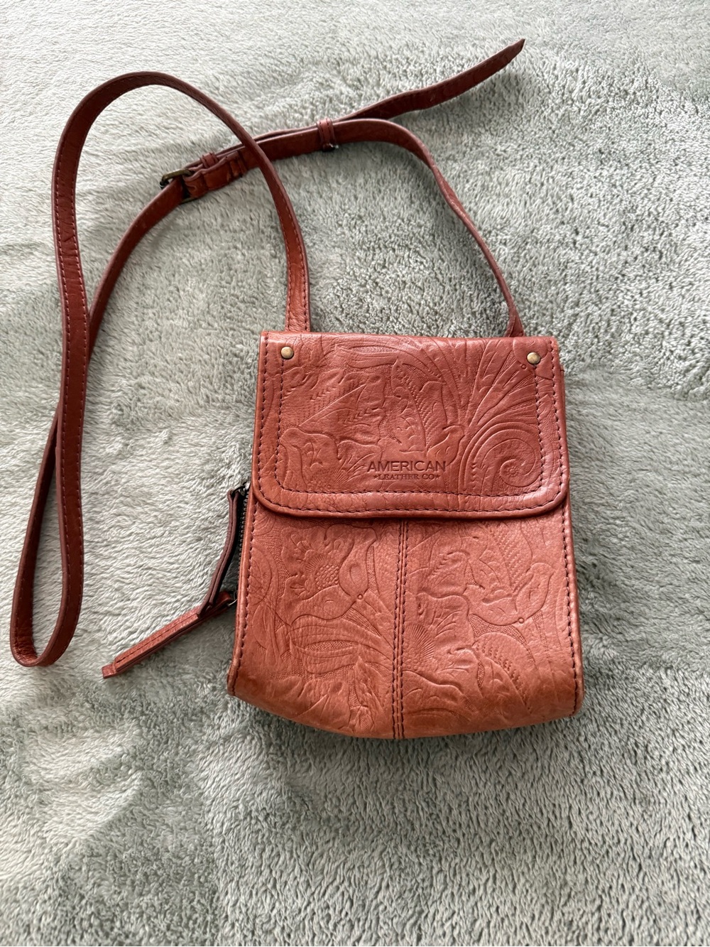 American leather company, Crossbody leather embossed.